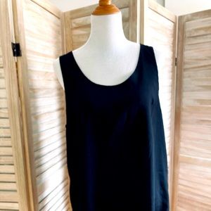 Sleeveless black top.